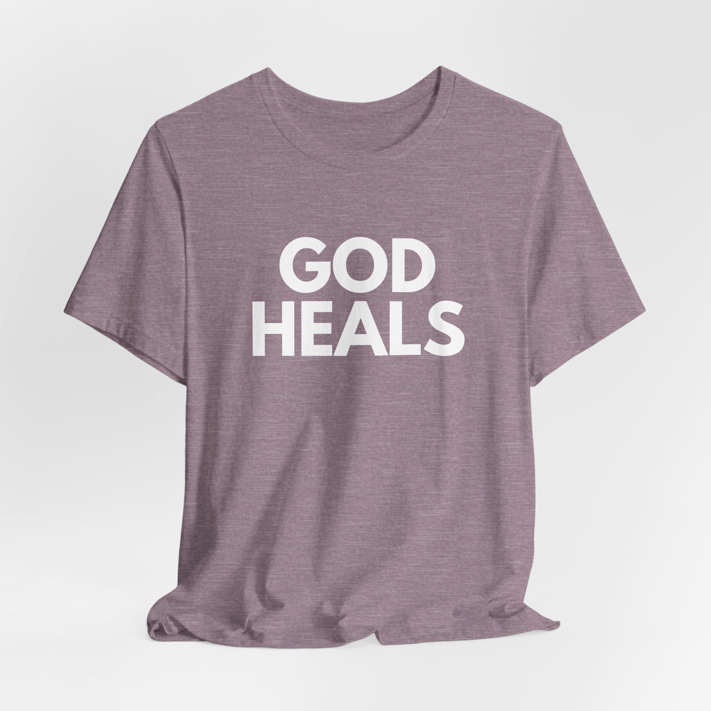 GOD HEALS Bold Statement Tee – Faith Over Fear Collection