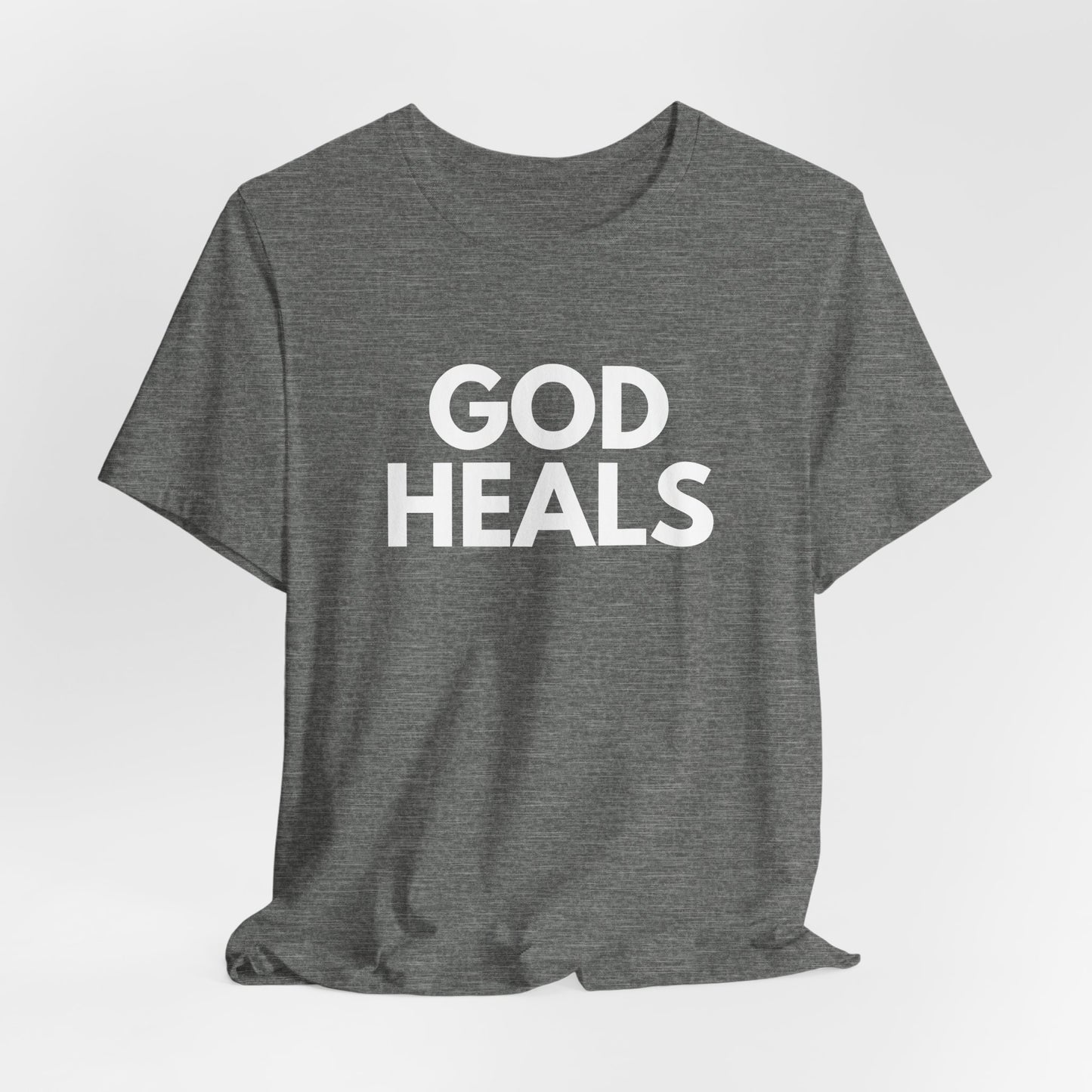 GOD HEALS Bold Statement Tee – Faith Over Fear Collection