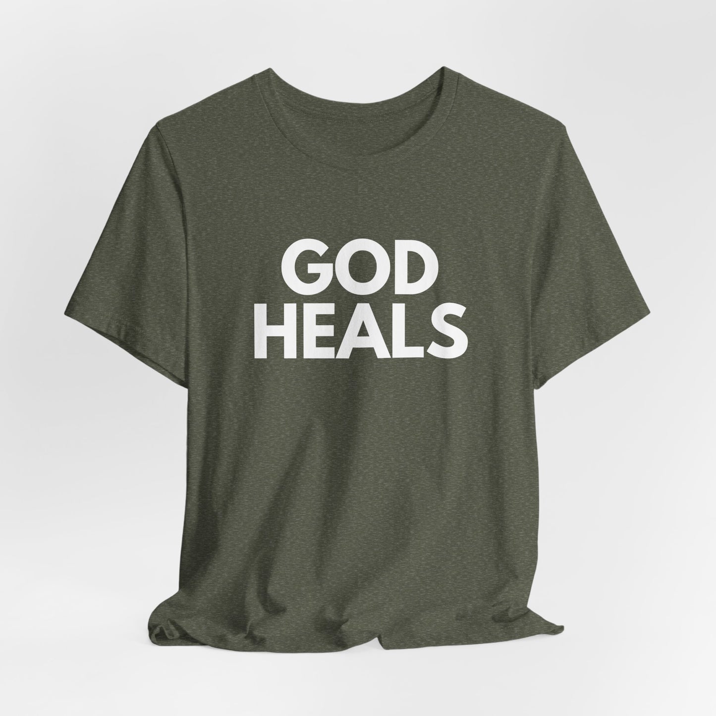 GOD HEALS Bold Statement Tee – Faith Over Fear Collection